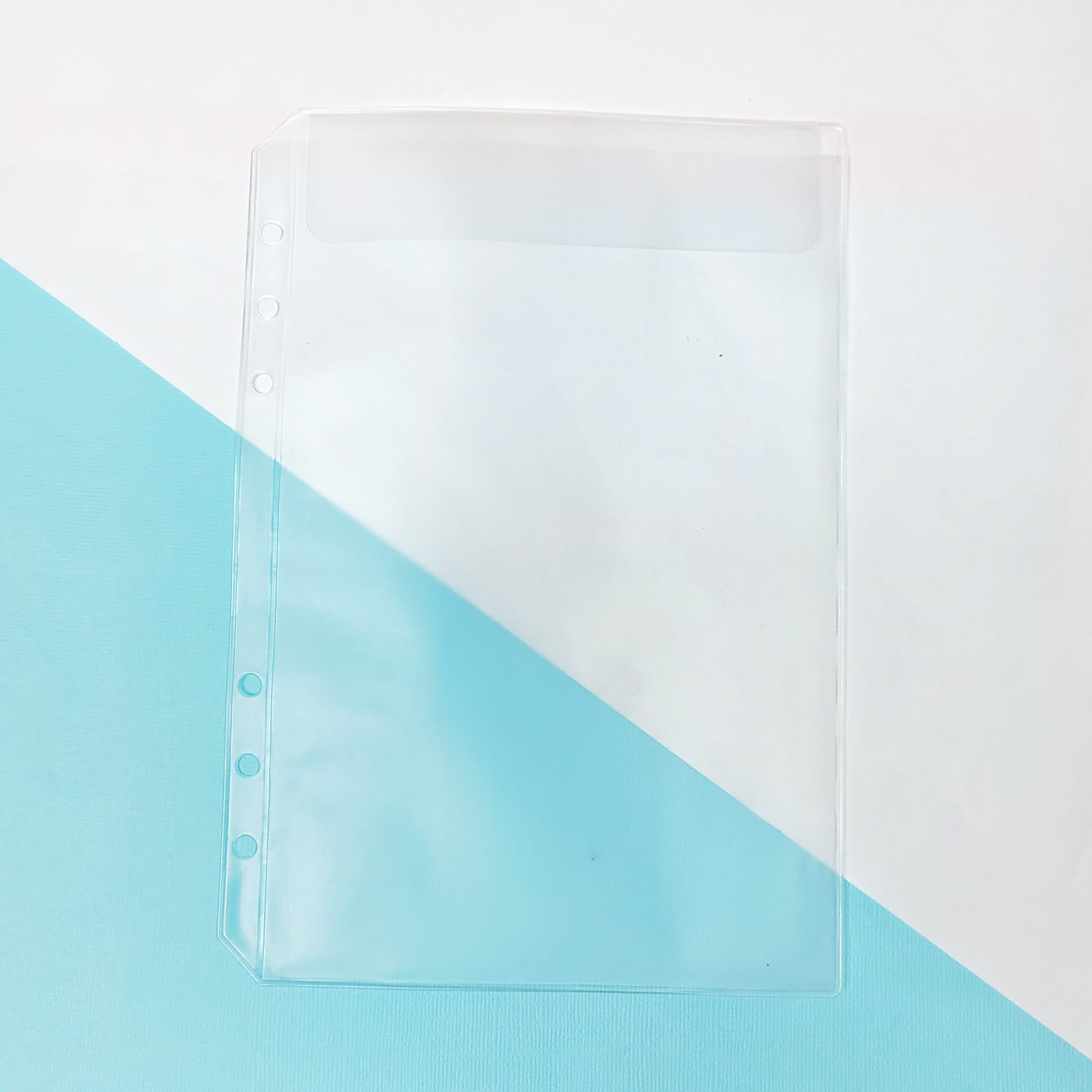 Pochette plastique non-perforée pour A6, ouverture petit côté, transparent